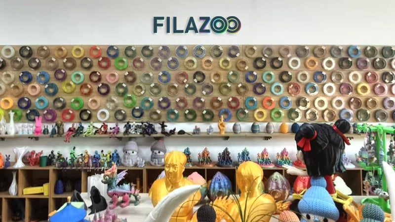 Filazoo filament color display wall showcasing a wide range of 3D printing filament spools