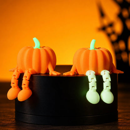 Articulated pumpkin Halloween 3D prints made with orange PLA filament