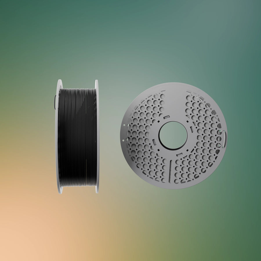 Two 3D printer filament spools shown on a smooth green-to-beige gradient background. One spool is shown from the side in black, and the other from the top showing the perforated gray plastic rim.